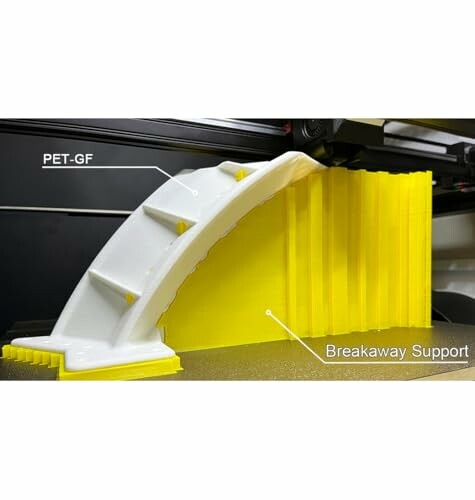 3D printer creating a white PET-GF object with yellow breakaway support.