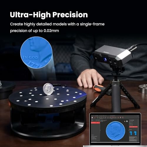 3D scanner setup with rotating platform and computer display
