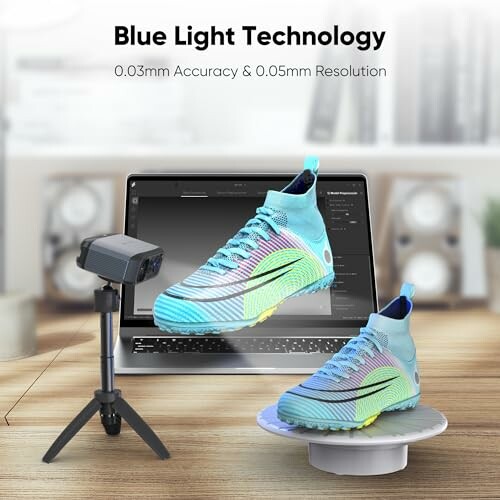 3D scanning of a colorful shoe using blue light technology with a laptop in the background.