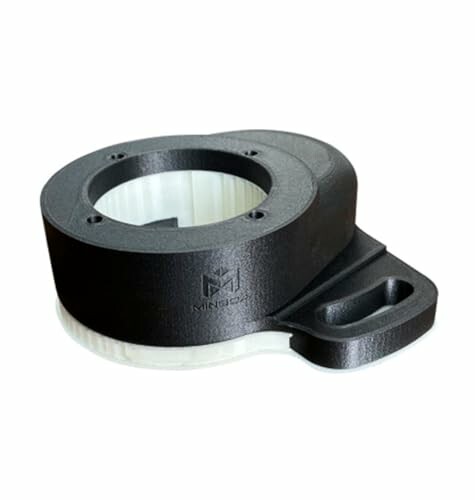 Black plastic component with circular opening.