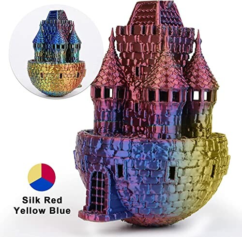 Vibrant 3D-printed castle in silk red, yellow, and blue hues.