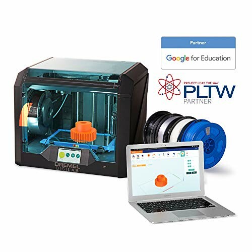 Dremel 3D printer with laptop and filament spools for educational use.