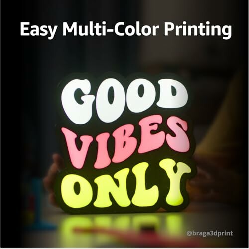 A 3D printed sign with 'Good Vibes Only' in multi-color text.