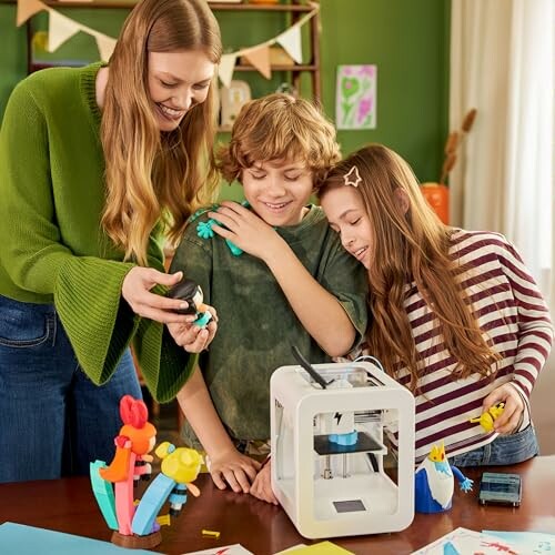 A family enjoying a 3D printing activity together.
